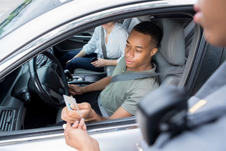 Driver giving police license